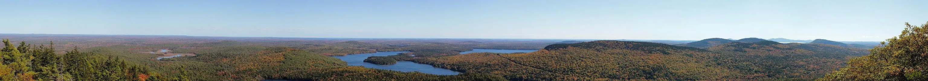 A panoramic view of low mountains and forest